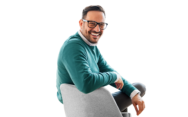 Man with Glasses Sitting in Chair